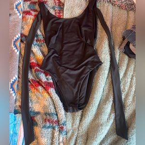 Black tie back Bodysuit. Size MEDIUM.
